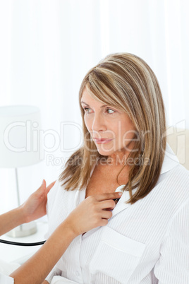 Retired woman with her nurse