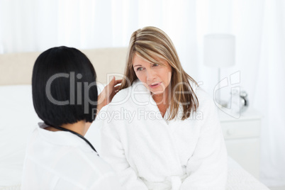 Senior talking with her nurse