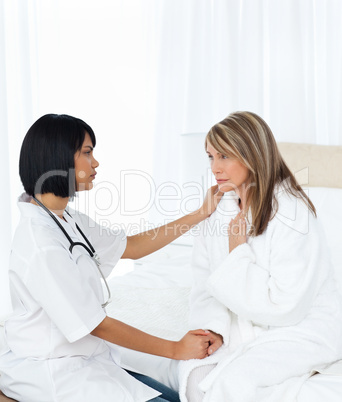 Senior talking with her nurse