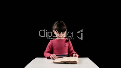reading girl on black background
