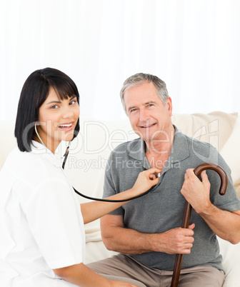 Nurse with her patient looking at the camera