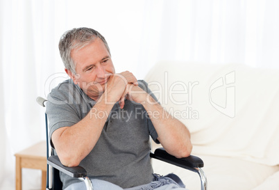 Retired man in his wheelchair