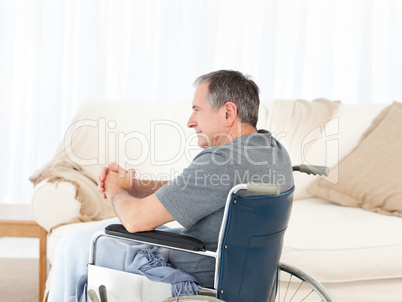 Retired man in his wheelchair