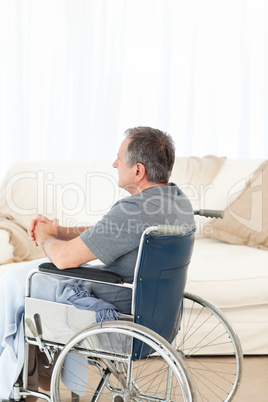 Retired man in his wheelchair