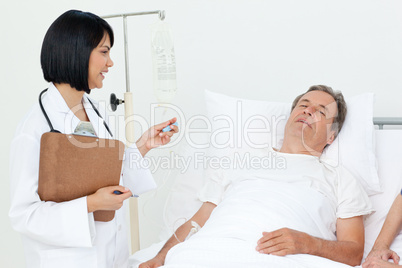 Nurse with a couple in a hospital