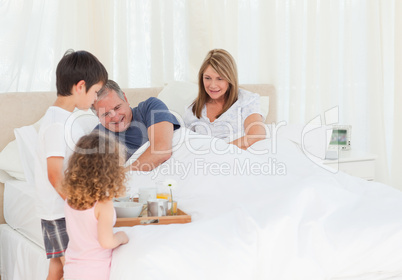 Family having breakfast at home
