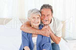 Senior couple looking at the camera