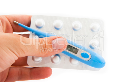 digital thermometer and tablet