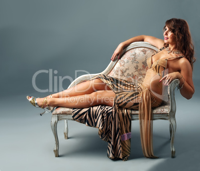 arabian dancer relax on  old-styled chair