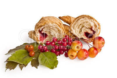 Croissant with berries and apples