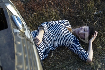 Young Blond Woman With Her Broken Car