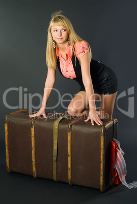 Beautiful girl with suitcase