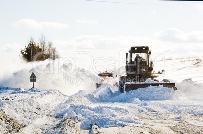 Removing snow from road