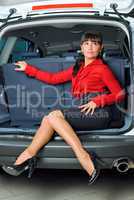 Woman in luggage compartment