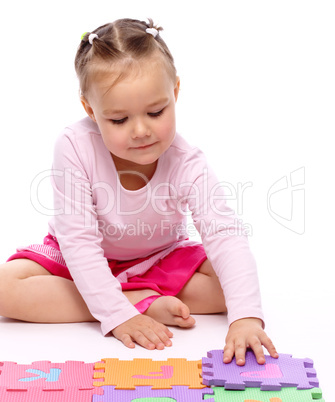 Little girl with alphabet