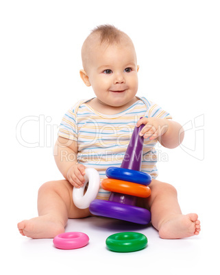 Little boy play with toys