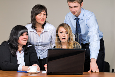 Businessgroup with laptop