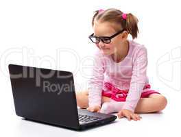 Little girl with laptop