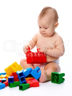 Little boy with building bricks