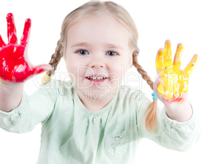 Little girl playing with colors