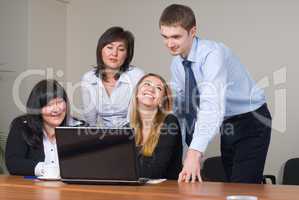 Businessgroup with laptop