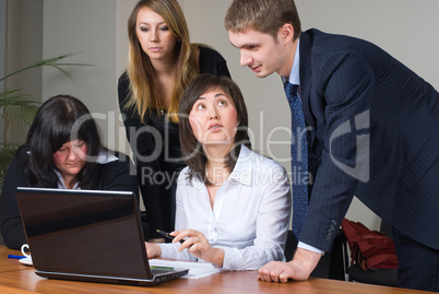 Businessgroup with laptop