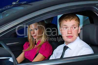 Young couple in car