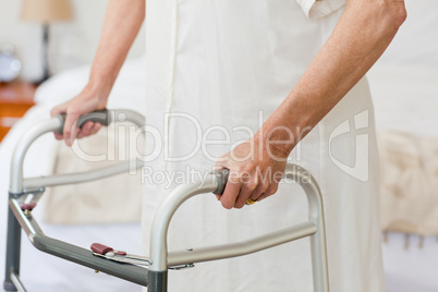 Senior woman with her zimmer frame