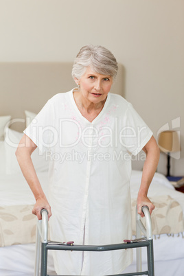 Senior woman with her zimmer frame