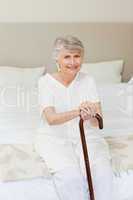 Retired woman with her walking stick