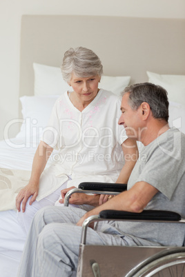 Mature couple in their bedroom