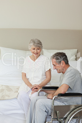 Mature couple in their bedroom