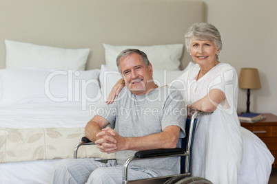 Mature couple in their bedroom