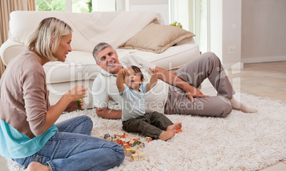 Son playing with his parents