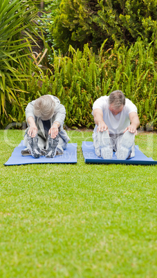 Senior couple doing their streches