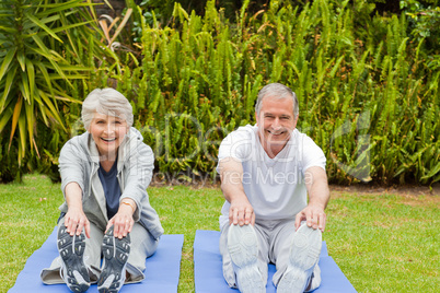 Senior couple doing their streches