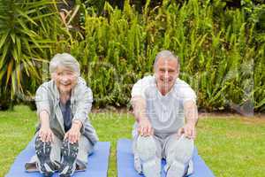 Senior couple doing their streches