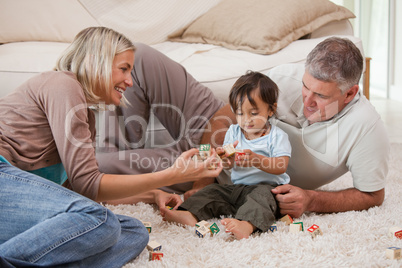 Son playing with his parents