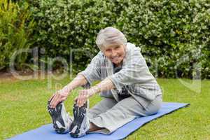 Senior woman doing her streches