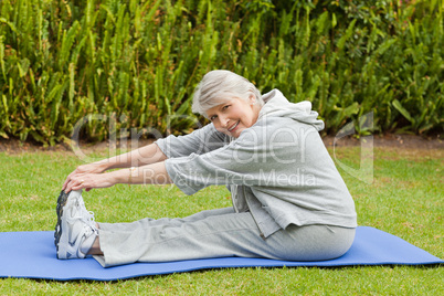 Senior woman doing her streches