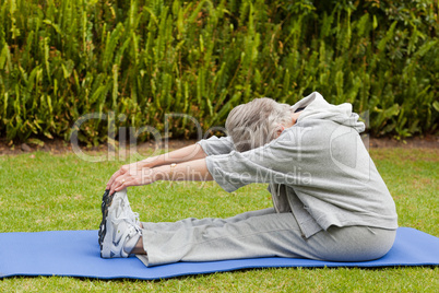 Senior woman doing her streches