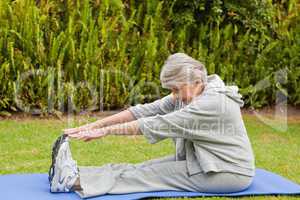 Senior woman doing her streches