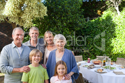 Portrait of a joyful family looking at the camera