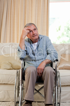 Senior man in his wheelchair Senior man in his wheelchair