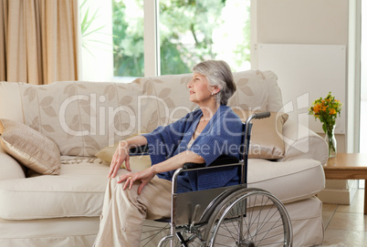 Retired woman in her wheelchair