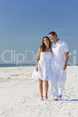 Romantic Couple Walking on An Empty Beach