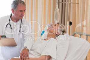 Doctor examining his patient