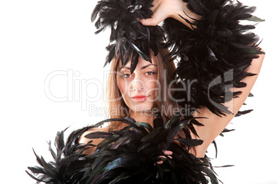 Pretty young girl in black boa isolated on white