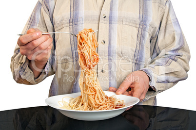 Human hands with fork and spaghetti