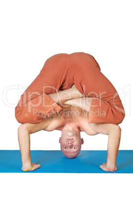 Man doing yoga exercise isolated on white